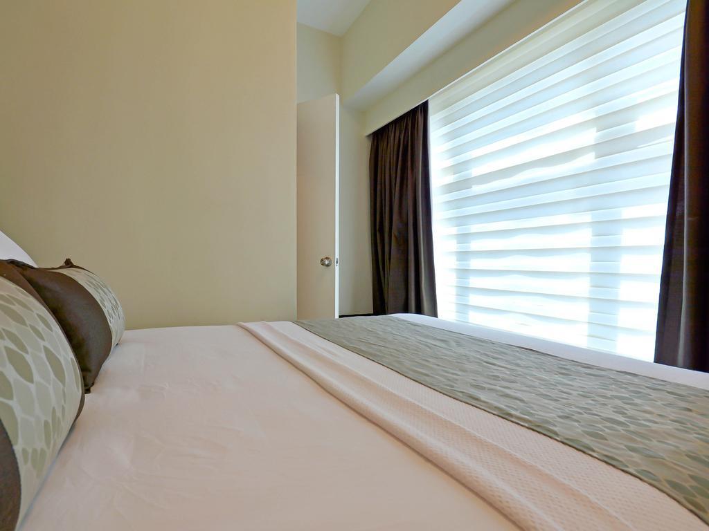 Currency Serviced Suites Manila Exteriör bild