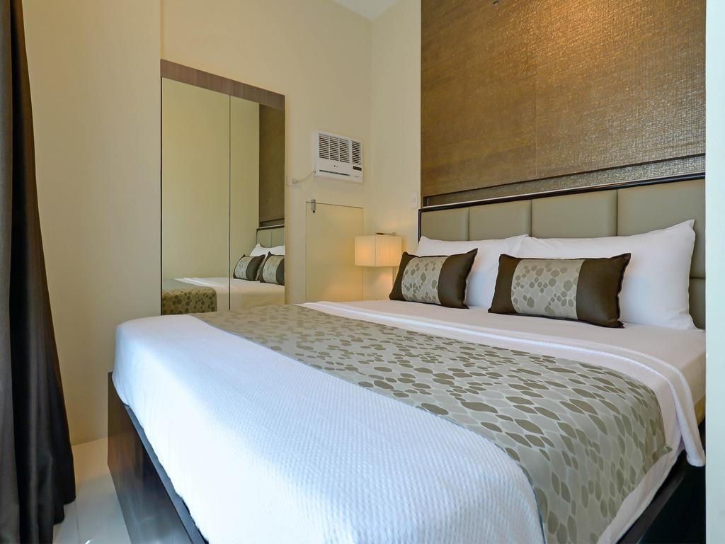Currency Serviced Suites Manila Exteriör bild
