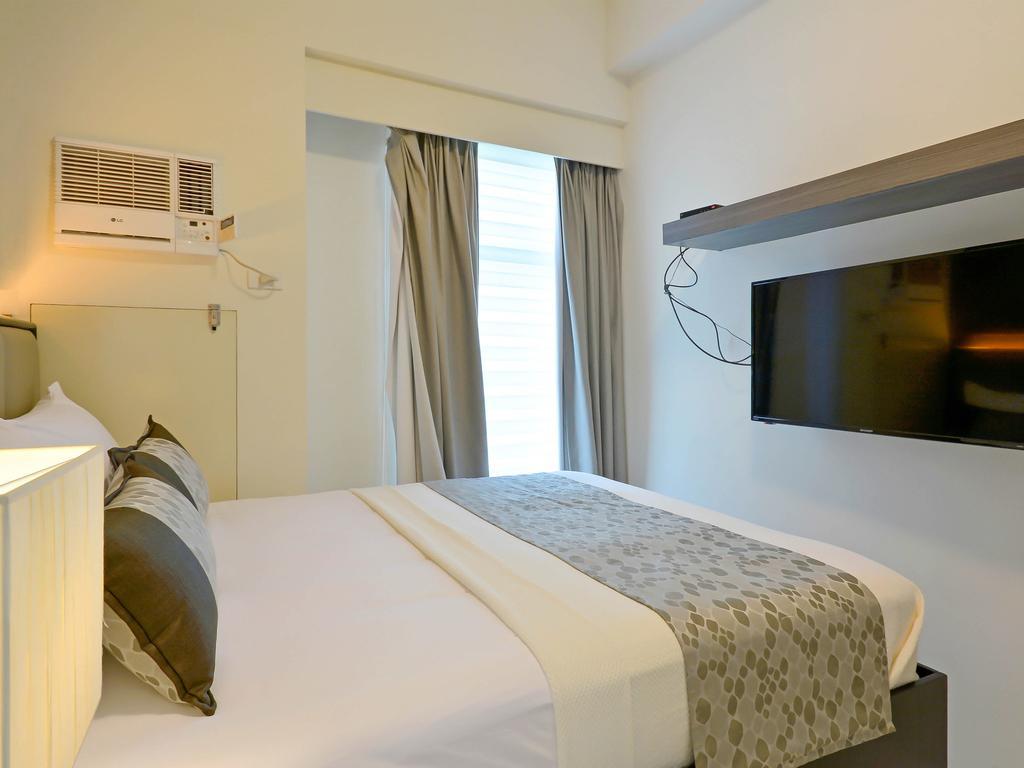 Currency Serviced Suites Manila Exteriör bild