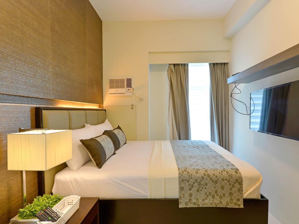 Currency Serviced Suites Manila Exteriör bild