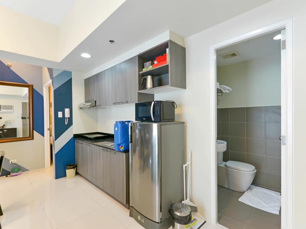 Currency Serviced Suites Manila Exteriör bild