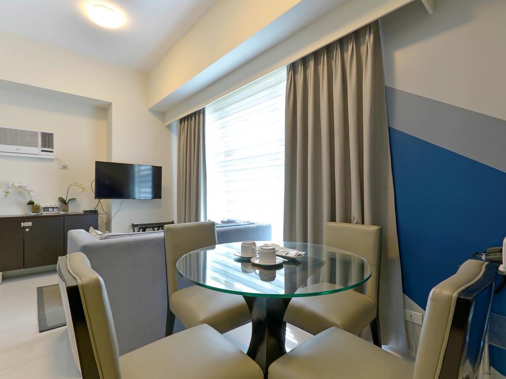 Currency Serviced Suites Manila Exteriör bild