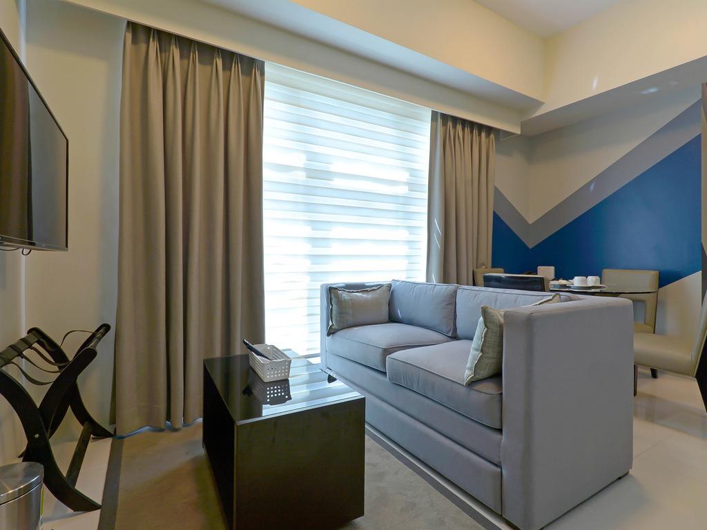 Currency Serviced Suites Manila Exteriör bild