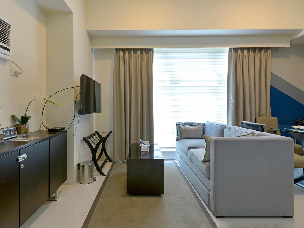 Currency Serviced Suites Manila Exteriör bild