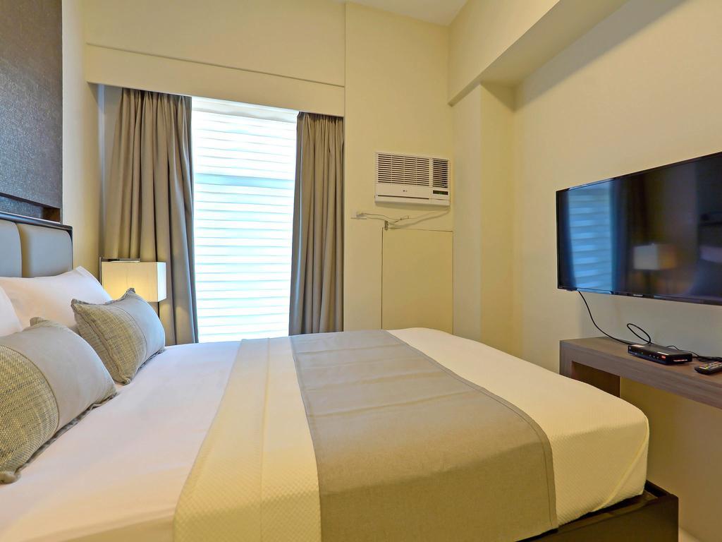Currency Serviced Suites Manila Exteriör bild