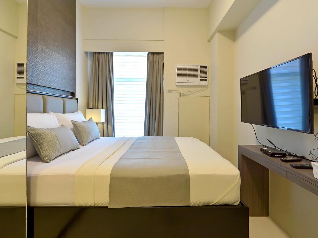 Currency Serviced Suites Manila Exteriör bild