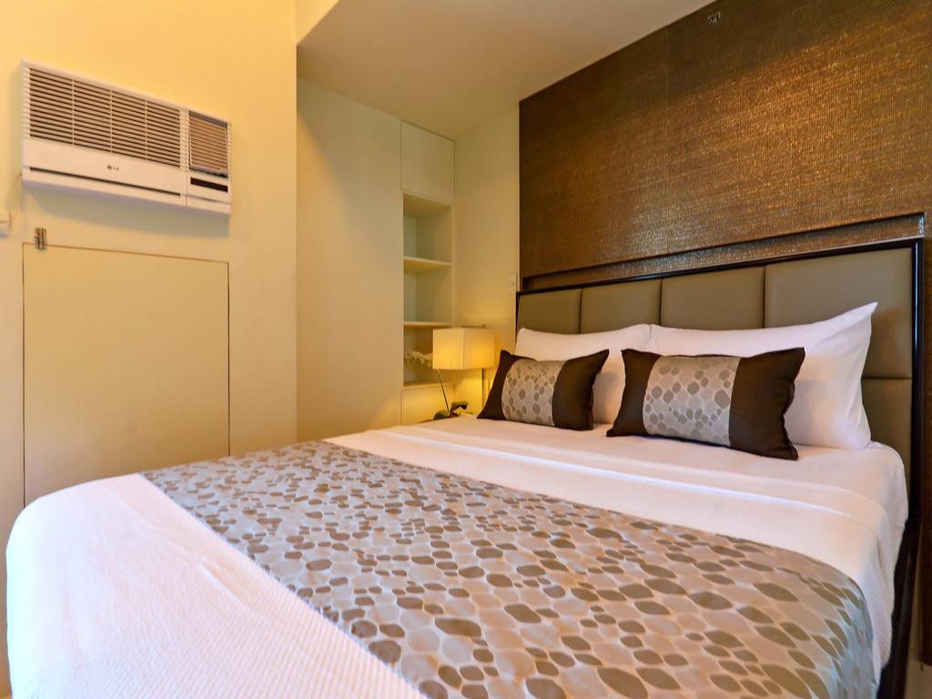 Currency Serviced Suites Manila Exteriör bild
