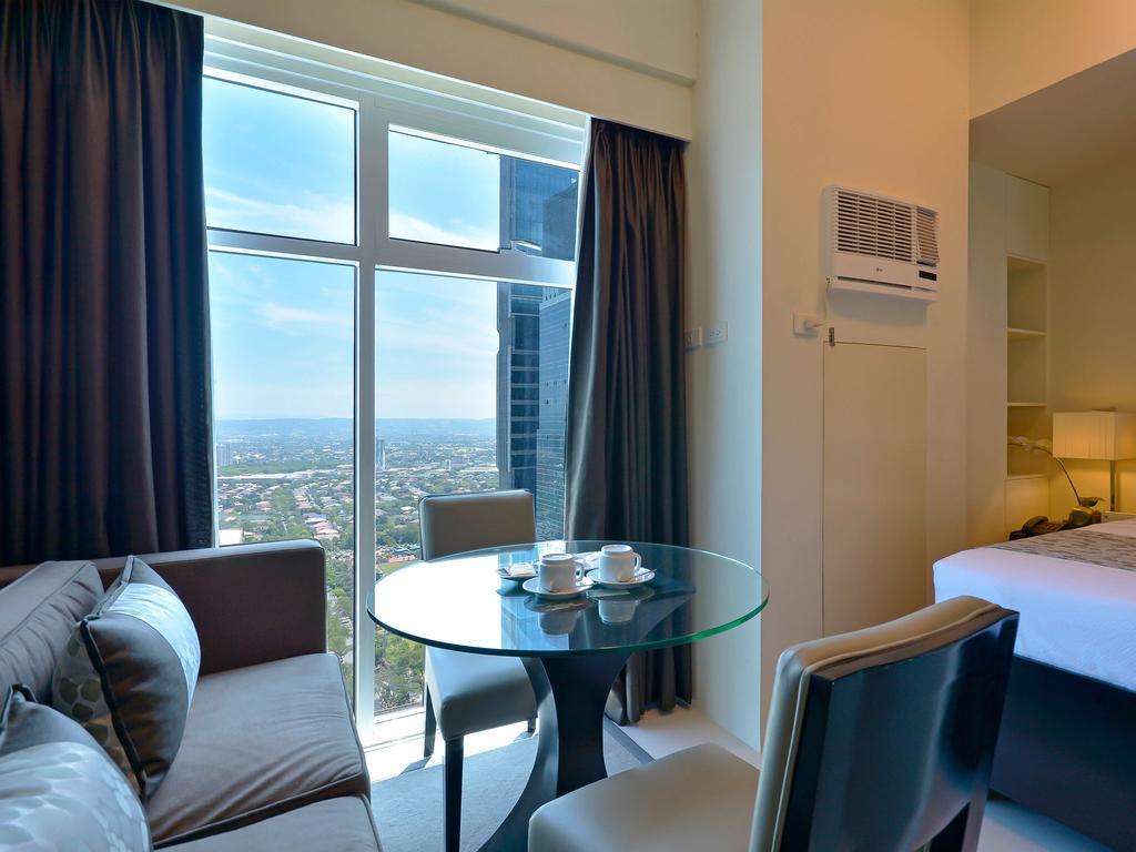 Currency Serviced Suites Manila Exteriör bild