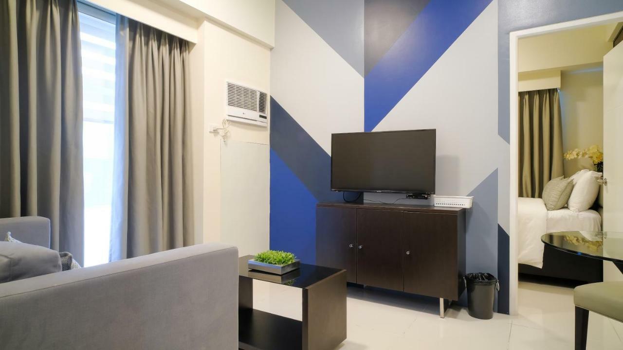 Currency Serviced Suites Manila Exteriör bild