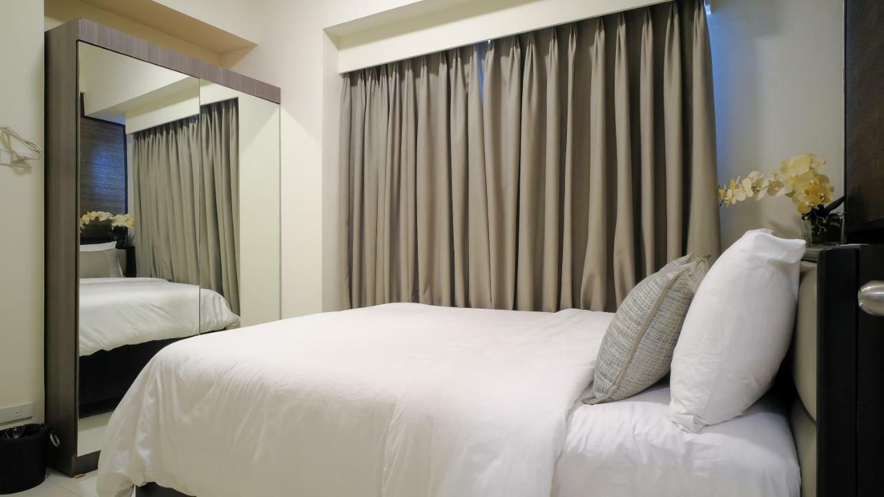 Currency Serviced Suites Manila Exteriör bild