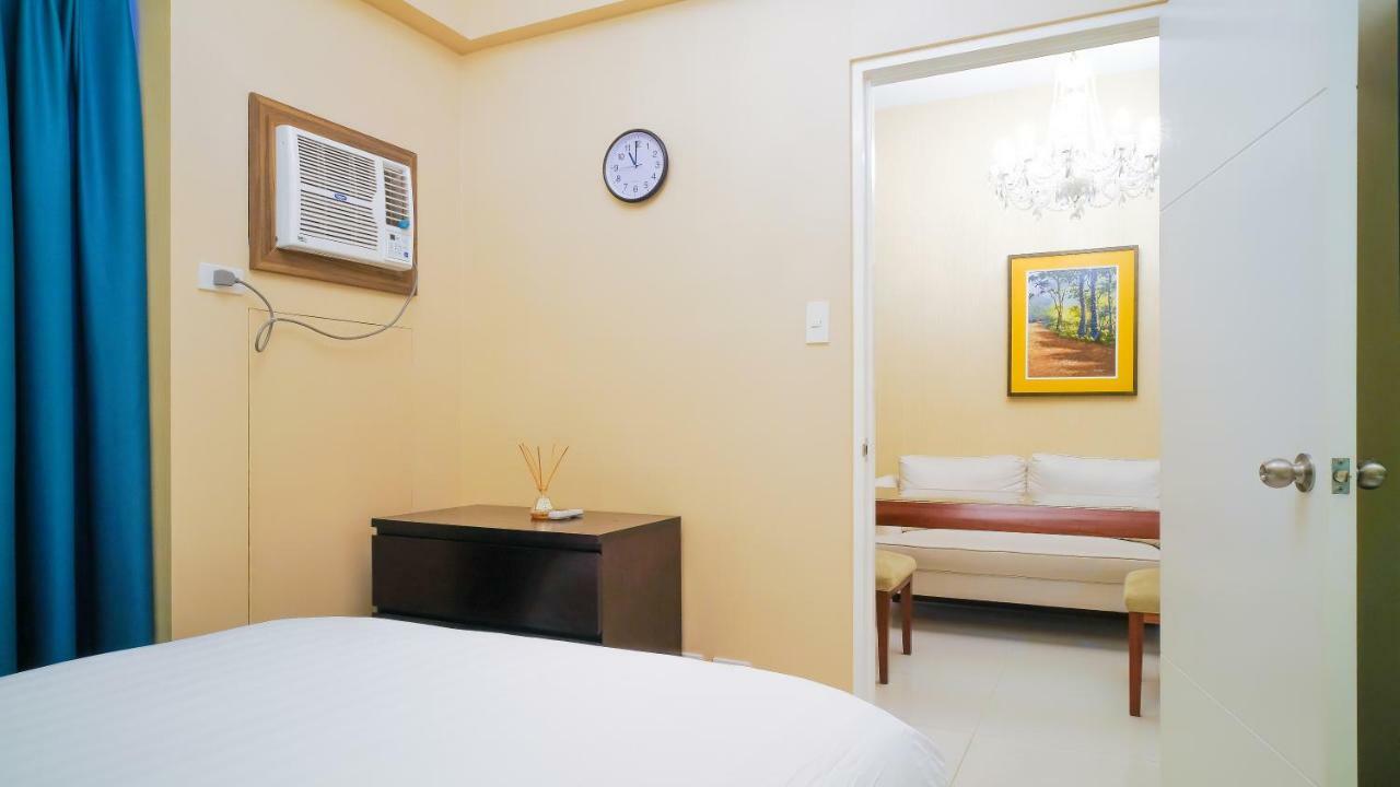 Currency Serviced Suites Manila Exteriör bild